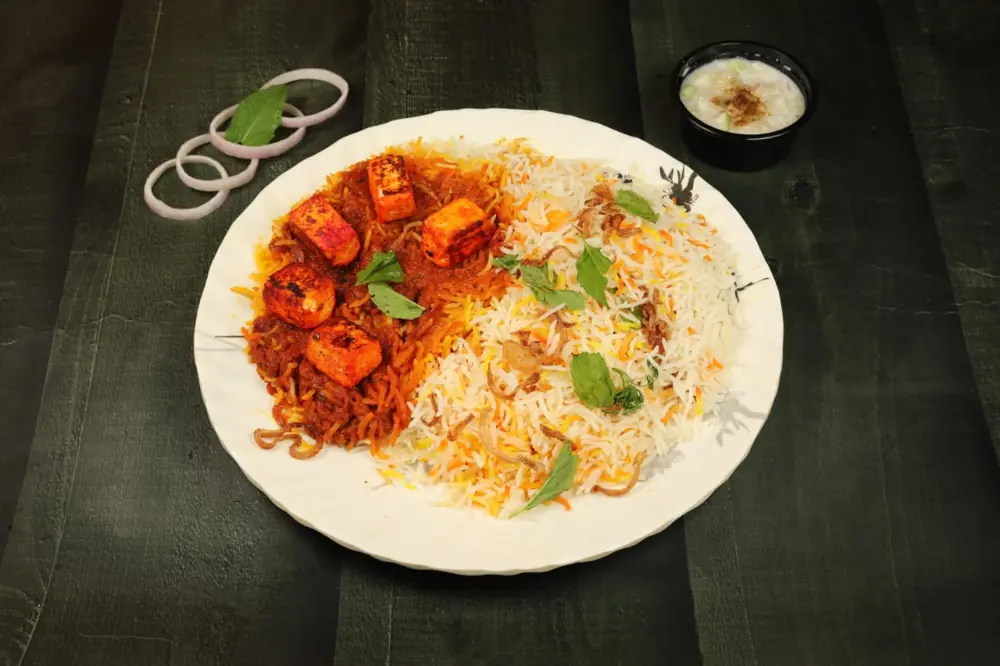 Paneer tikka biryani with charred paneer and peppers